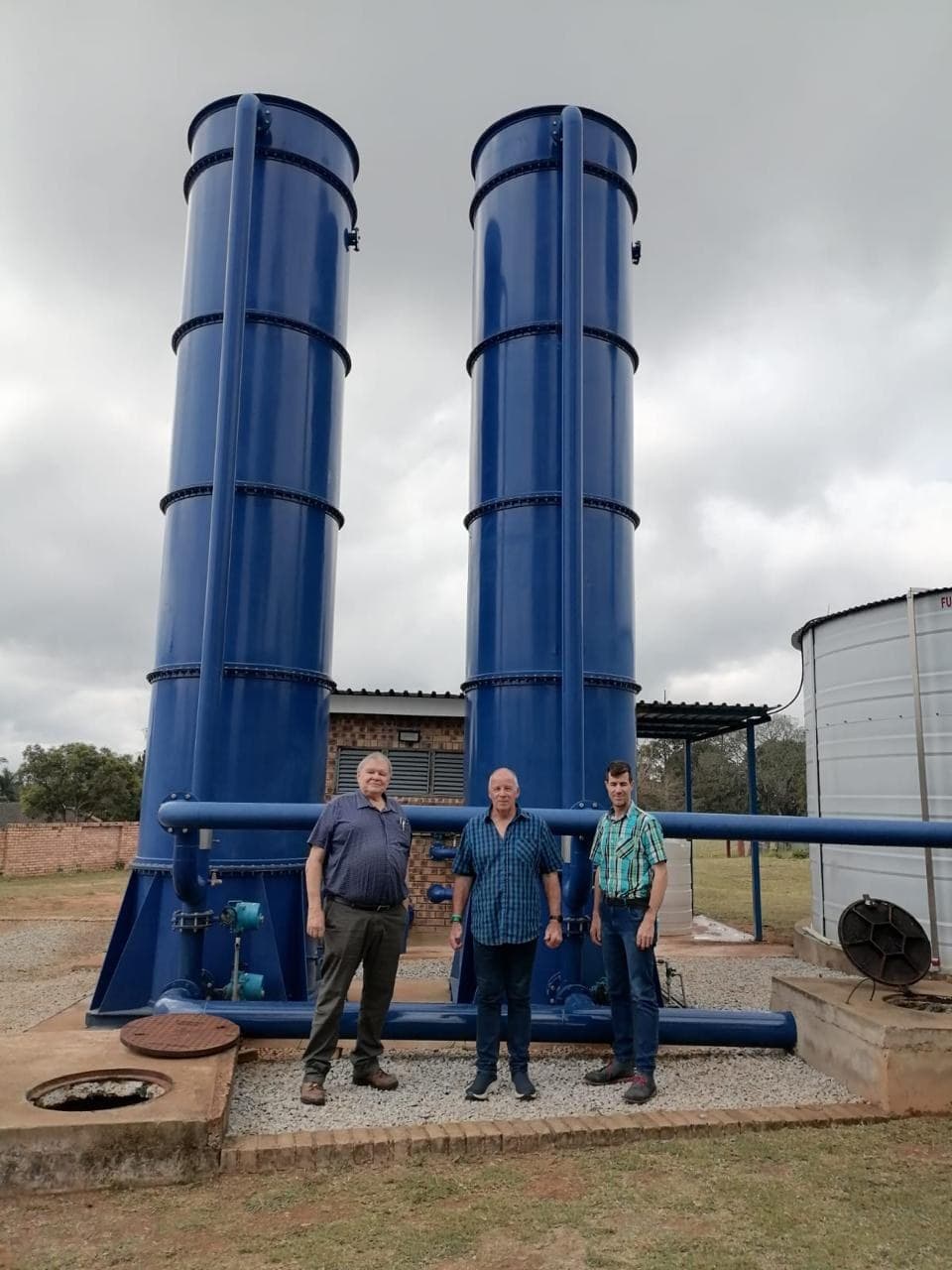 Andre Laubscher and Bryan Van Niekerk of Agri Platinum with our technical partner at a Compact Clean Water Treatment plant